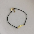 Bransoletka ze STALI CHIRURGICZNEJ piórko sznurek czarny Blueberry