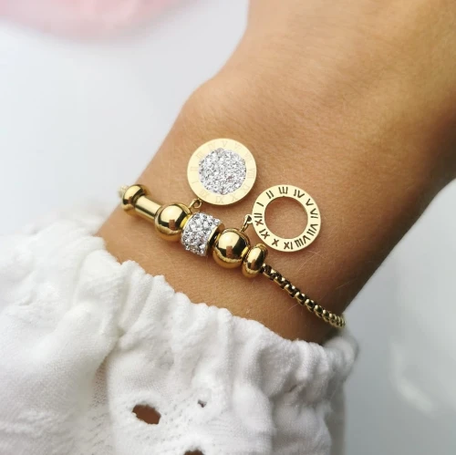 Bransoletka ze STALI CHIRURGICZNEJ modułowa  okrągłe zawieszki greckie cyrkonie  kolor złoty