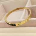 Bransoletka bangle STAL CHIRURGICZNA Złota sztywna czarno-złota Blueberry.jpg