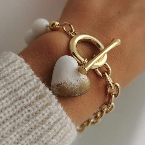 Bransoletka biały onyks PĘKATE SERCE kolor złoty Colibra