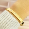Bransoletka STAL CHIRURGICZNA sztywna bangle klasyczna z kryształkami złota