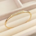 Bransoletka BANGLE POZŁACANA złota sztywna kryształy rose gold
