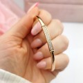 Bransoletka BANGLE POZŁACANA złota sztywna kryształy rose gold