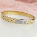 Bransoletka STAL CHIRURGICZNA złota sztywna bangle kryształki
