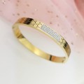 Bransoletka STAL CHIRURGICZNA złota sztywna bangle kryształki