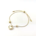 Bransoletka ze STALI SZLACHETNEJ zaciągana serce perłowe kolor złoty