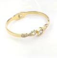 Bransoletka STAL CHIRURGICZNA sztywna banglekryształ  cyrkonie kolor złoty