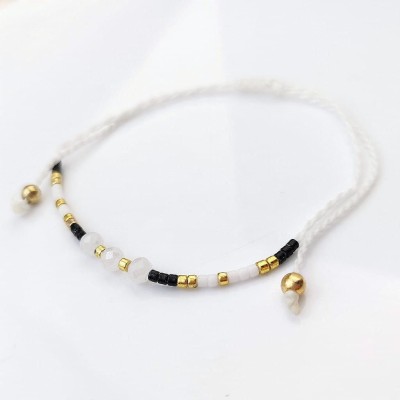 Bransoletka kryształki na sznurku  ze STALI CHIRURGICZNEJ biała