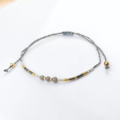 Bransoletka kryształki na sznurku  ze STALI CHIRURGICZNEJ szara