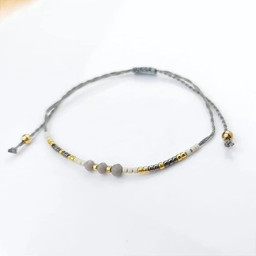 Bransoletka kryształki na sznurku  ze STALI CHIRURGICZNEJ szara