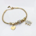 Bransoletka ze STALI CHIRURGICZNEJ modułowa serce miś kostki kryształy kolor złoty