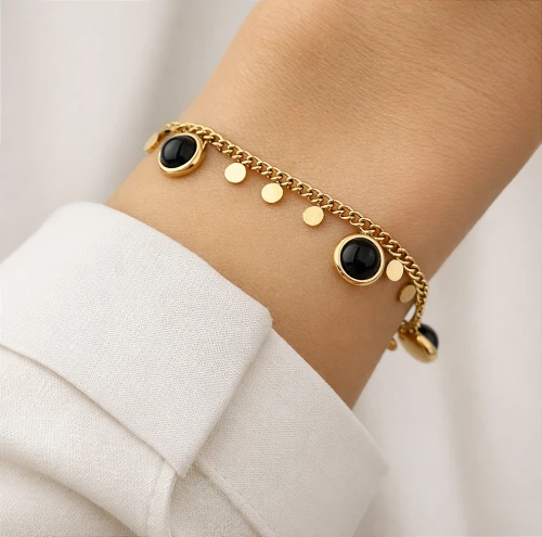 Złota bransoletka z czarnymi kryształami i monetkami STAL CHIRURGICZNA