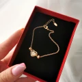 Bransoletka pozłacana SERDUSZKO serce  kryształki kuleczki rose gold